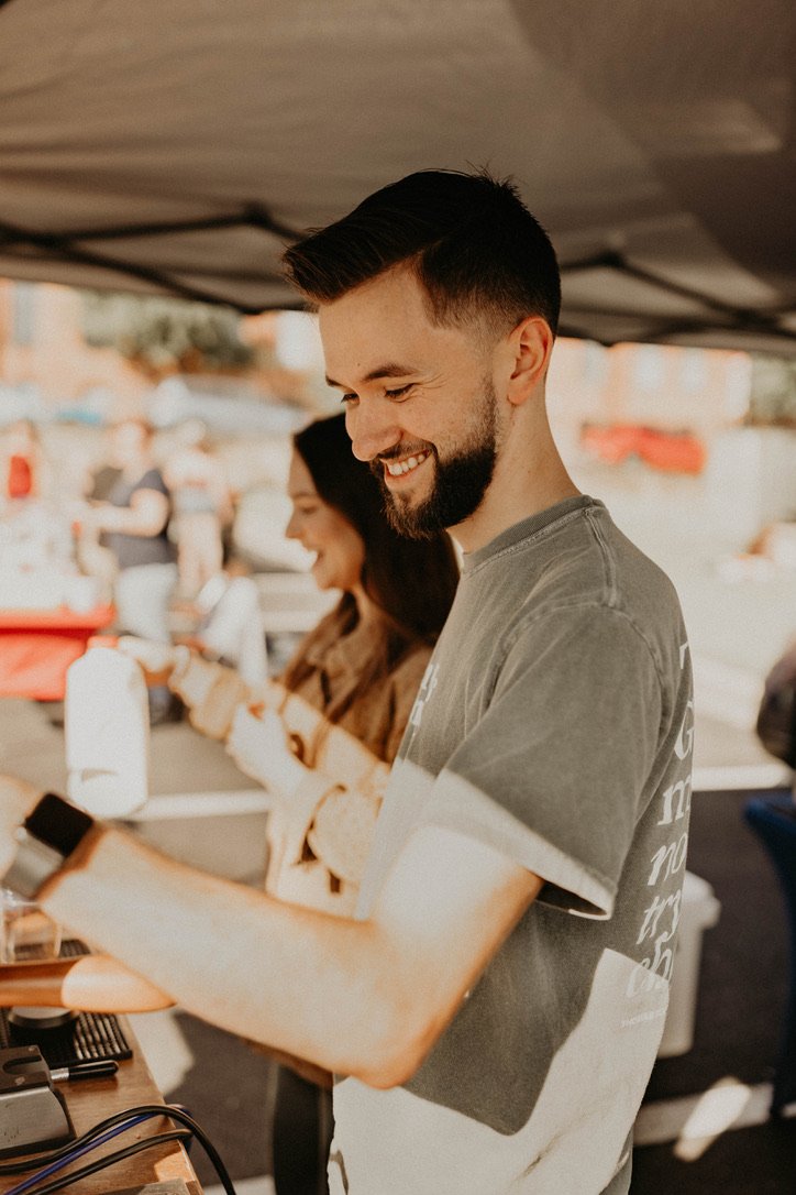 A Glory Coffee barista preparing a drink